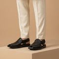 Black Leather Slingback Shoes with Distinct Cross-Over Design